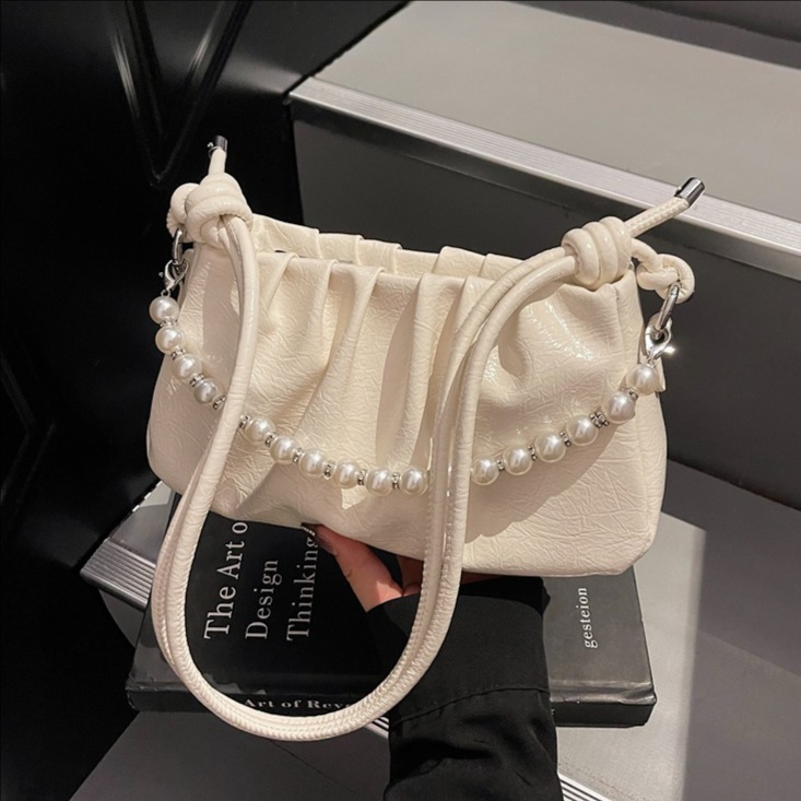 Nicho transfronterizo bolsos de brazo con cuentas para mujeres otoño / invierno 2025, nueva moda, bolsos de hombro casuales, bolsos mochilas de moda