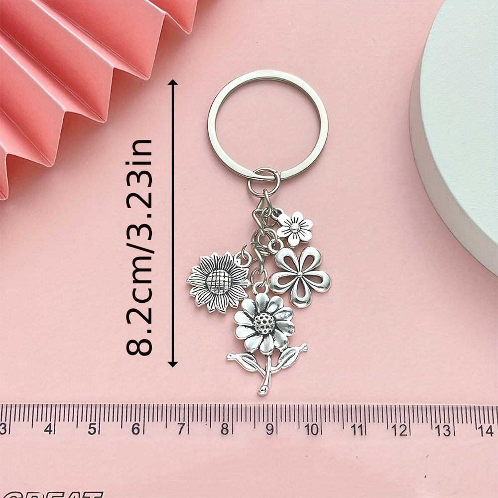 Serie de oro de aleación de venta transfronteriza caliente fútbol béisbol rugby sombrero hechicero puño llavero colgante mochila