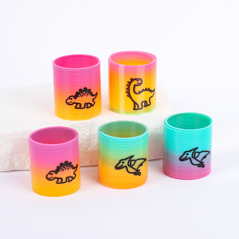 子供の魔力の虹の輪の表情の笑顔の虹のスプリングの輪の露店の弾力の積み重ねの輪の知育のノスタルジックなおもちゃ|undefined