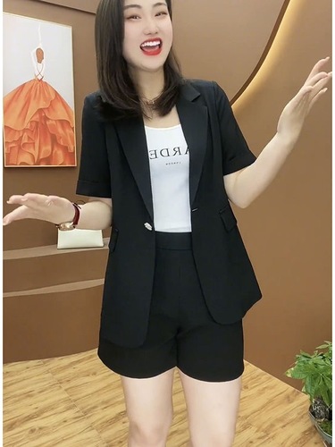 Plus-size women's casual shorts and suit set for summer—timeless, trendy, and stylish two-piece outfit designed to flatter curves.