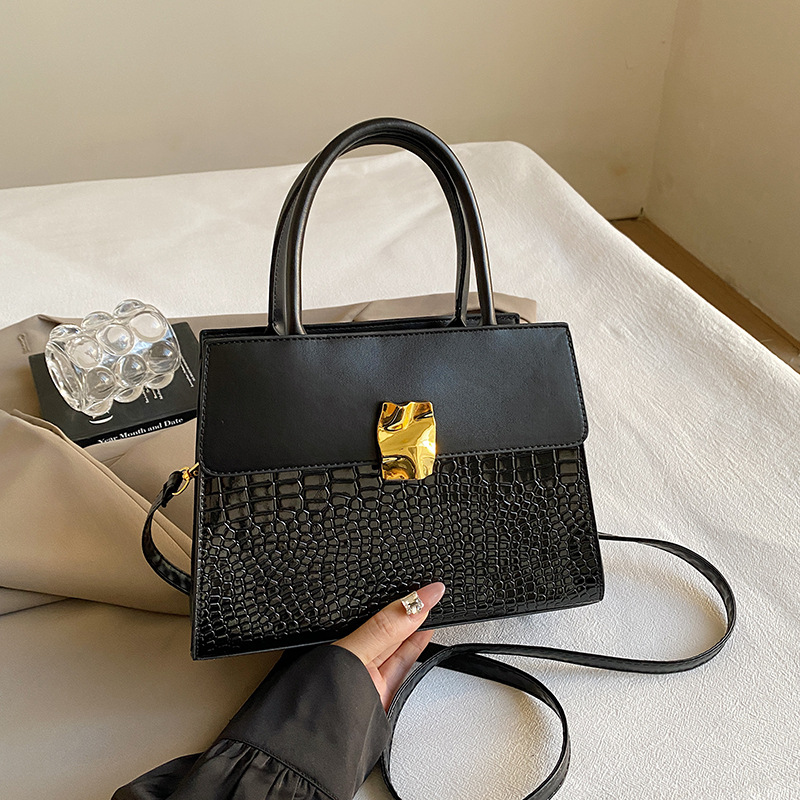 Bolso de diseño de nicho de alto nivel para mujeres 2024 nueva moda versátil bolso de hombro portátil bolso de viaje