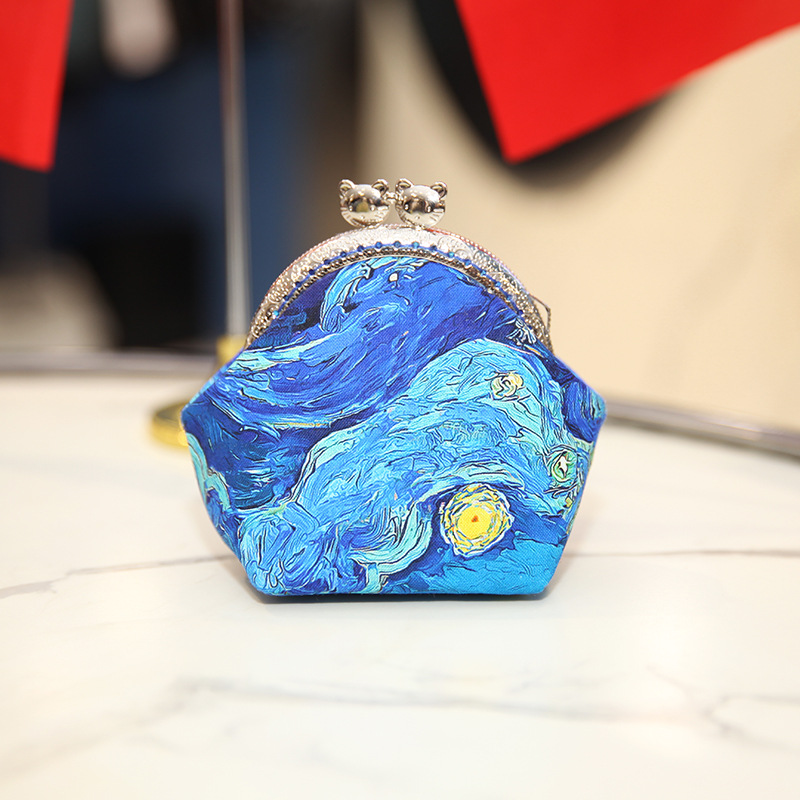 Bolsa de material de bordado bricolaje hecho a mano 8,5 boca Bolsa de Oro patchwork bolsa antigua bolsa transfronteriza inglés gato bolsa de almacenamiento