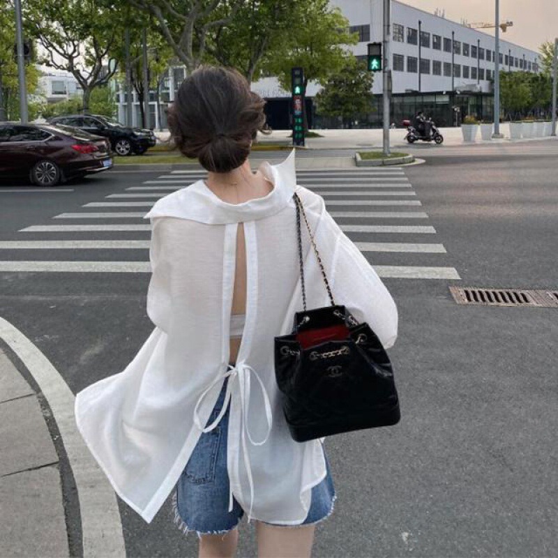 Back killer 2021 summer Korean style sun protection shirt women's design sense niche back strap all-match white shirt women's fashion