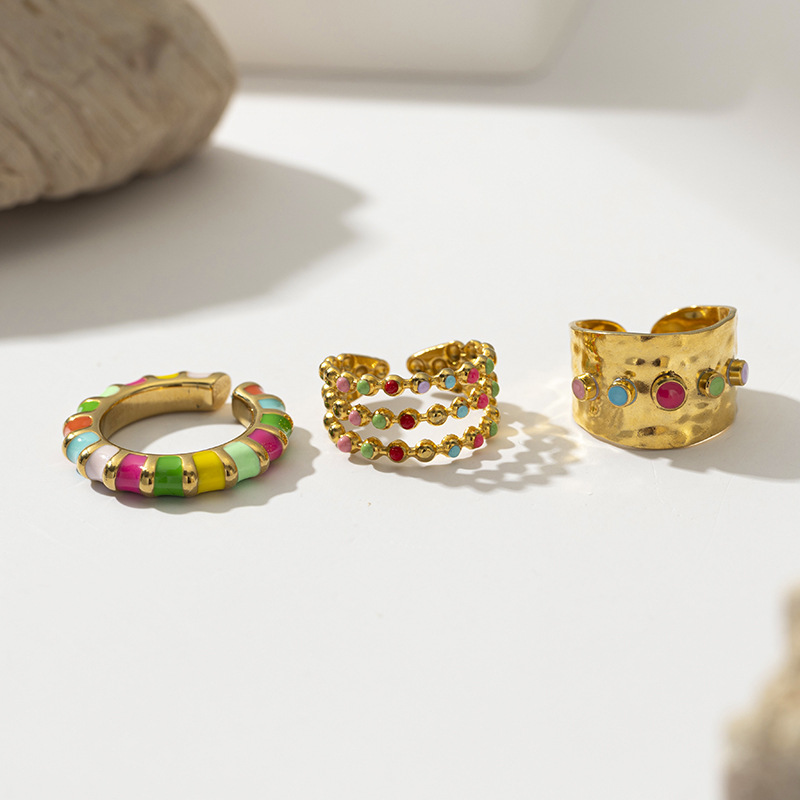 Anillos de acero inoxidable de color de goteo de aceite de TINA 18k oro de alto nivel europeo y americano lindos anillos de joyería de acero de titanio transfronterizo