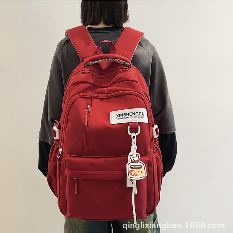 2025 new Korean high school schoolbag large capacity lightweight simple solid color backpack computer backpack wholesale