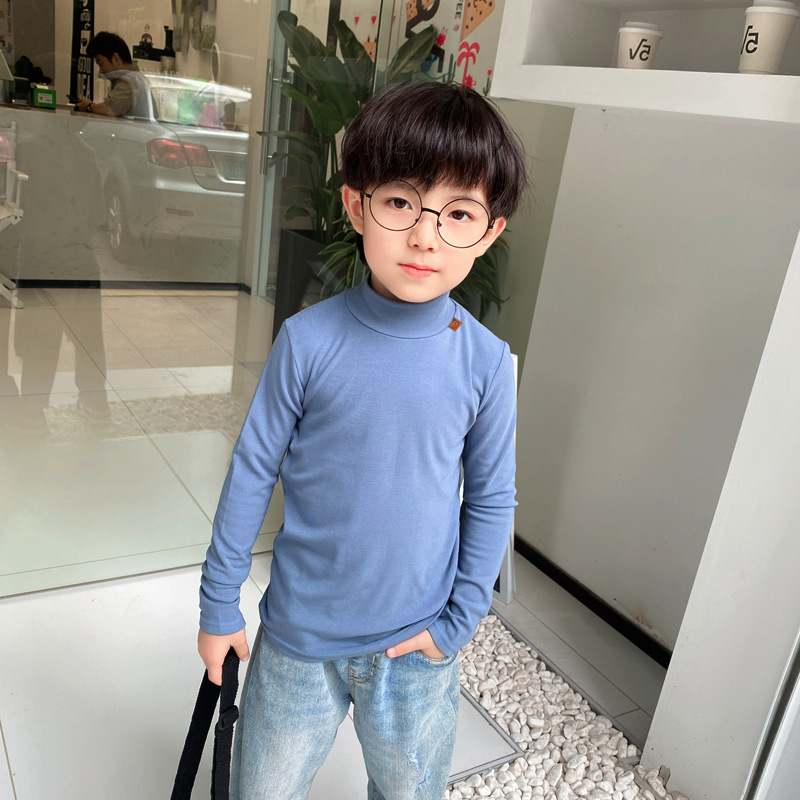 Ropa de otoño e invierno para niños nuevo estilo coreano color sólido camiseta de los muchachos medio cuello alto camisa de fondo para niñas engrosada bebé manga larga superior