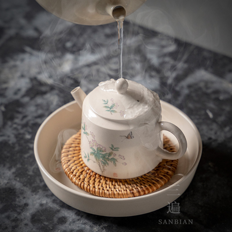 Fábrica al por mayor tejida a mano Vietnam ratán montaña juego de té ratán olla estera Vietnam viejo ratán montaña té