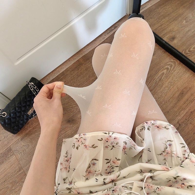 愛の白いストッキングの女性の春夏の薄いタイプの甘い蝶結びの白いタイツのロリータの丸い波はjk黒い糸をつけます。|undefined