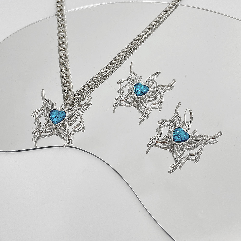 Juego de collar y pendientes mariposa con cristal corazón azul_voghion.com