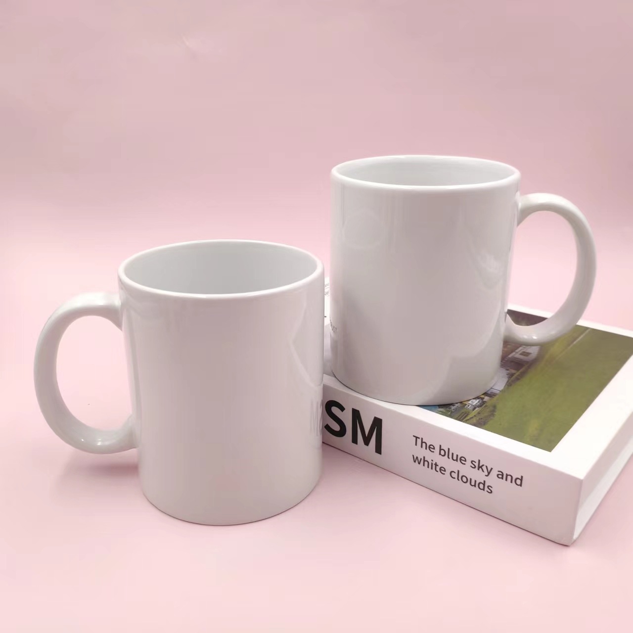 Taza en blanco recubrimiento al por mayor Taza de imagen de transferencia de calor Taza de sublimación de calor Taza de cerámica 11 onzas Taza blanca Regalos de comercio exterior