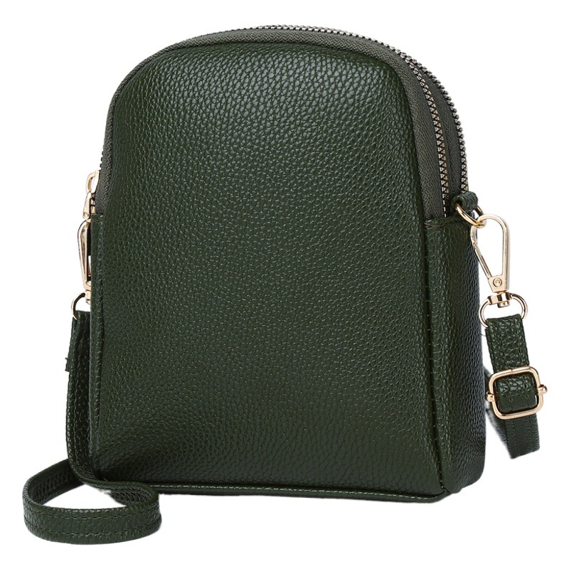 2023 nuevo contraste de color pequeño bolso redondo de lujo ligero estilo Chanel textura lychee patrón de hombro bolsa de mensajero de las mujeres bolsa de teléfono