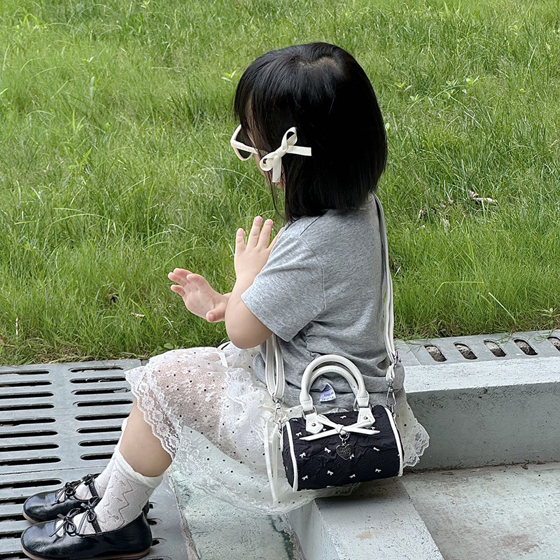 Coreano dulce arco bolso de niña mini lindo bebé bolso de barril de diseño de moda bolso de niños