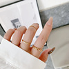 Golden ring, set, suitable for import, on index finger
