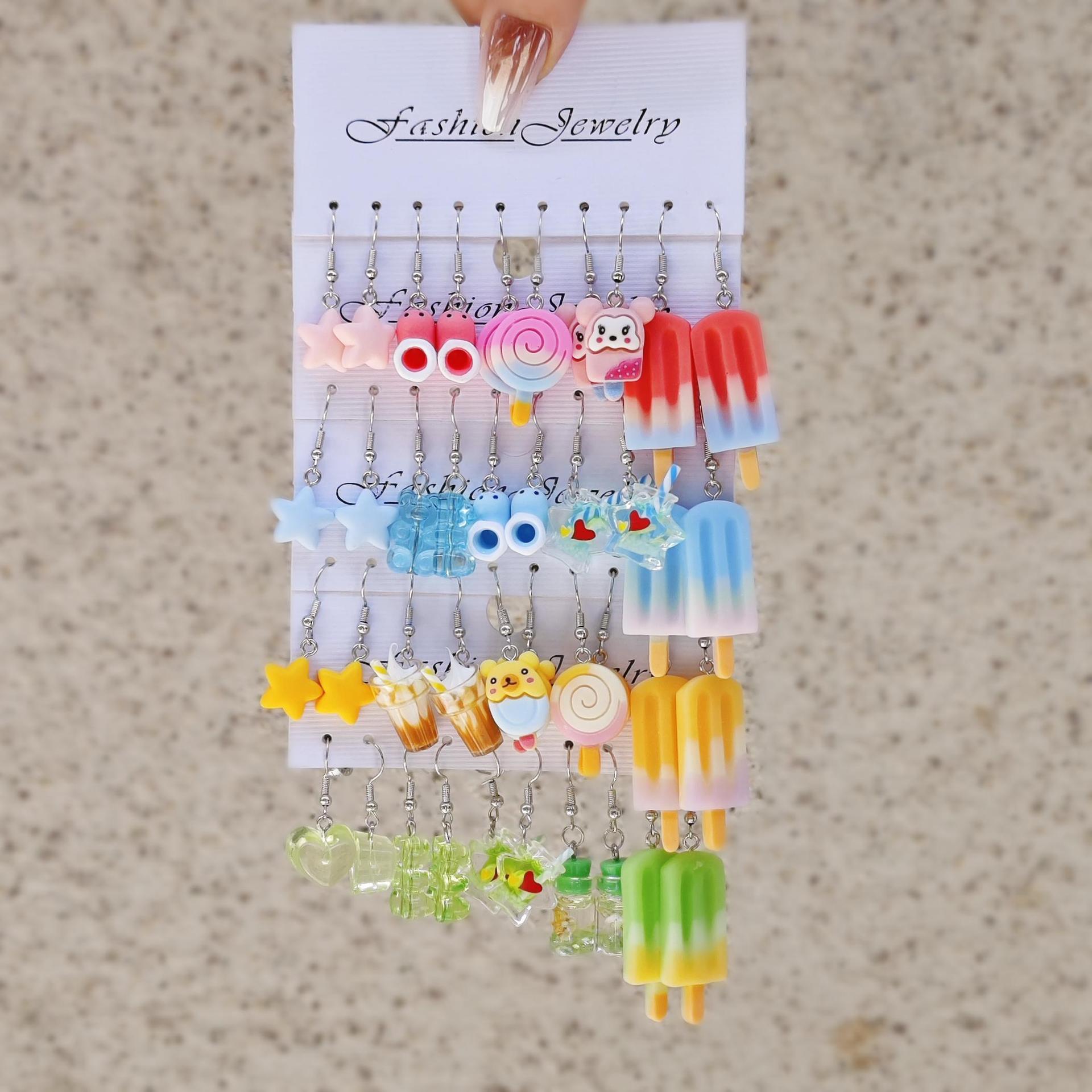 Moda transfronteriza de venta caliente de dibujos animados animales de caballo blanco resina de margarita simulación de alimentos donut auriculares multi-pieza conjunto