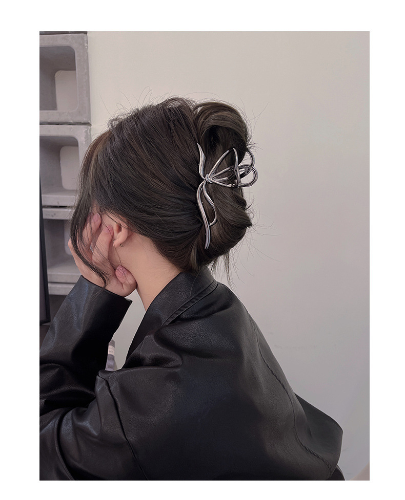 امرأة نمط Ig أنيق عقدة القوس سبيكة تصفيح مخالب الشعر display picture 1