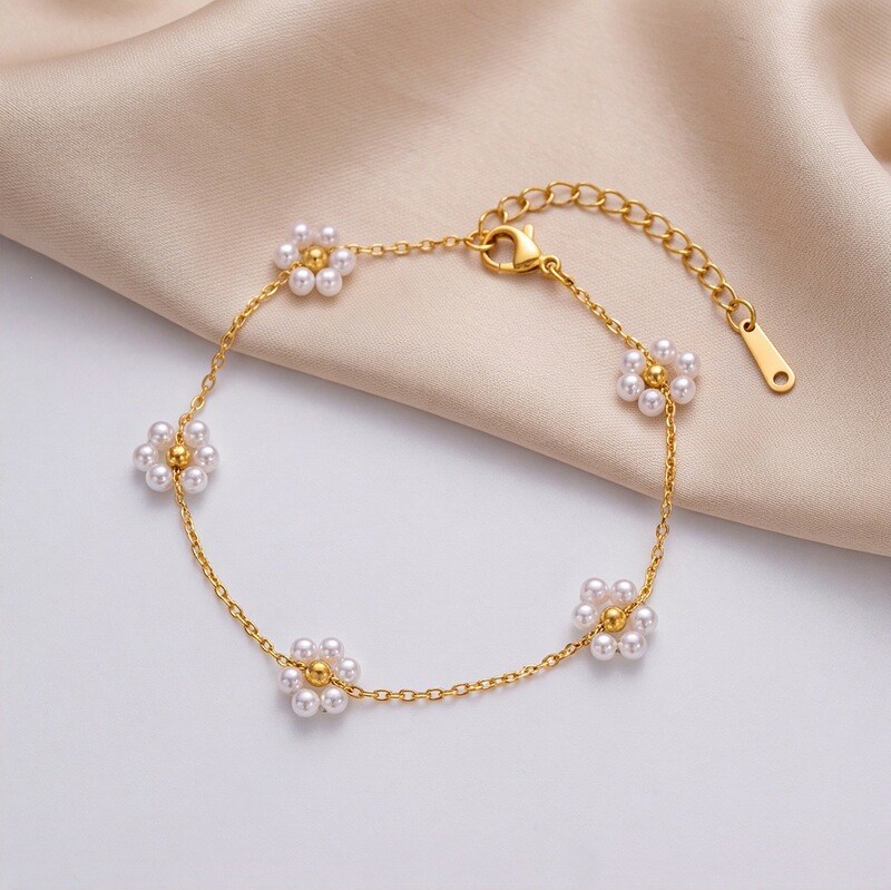 European and American cross-border woven white pearl flower stainless steel bracelet for women, light luxury, high-end fashion titanium steel jewelry
