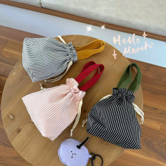 Cute drawstring storage bag, cuffed handbag, portable and cute water cup bag, fashionable outing sundries, women's makeup bag