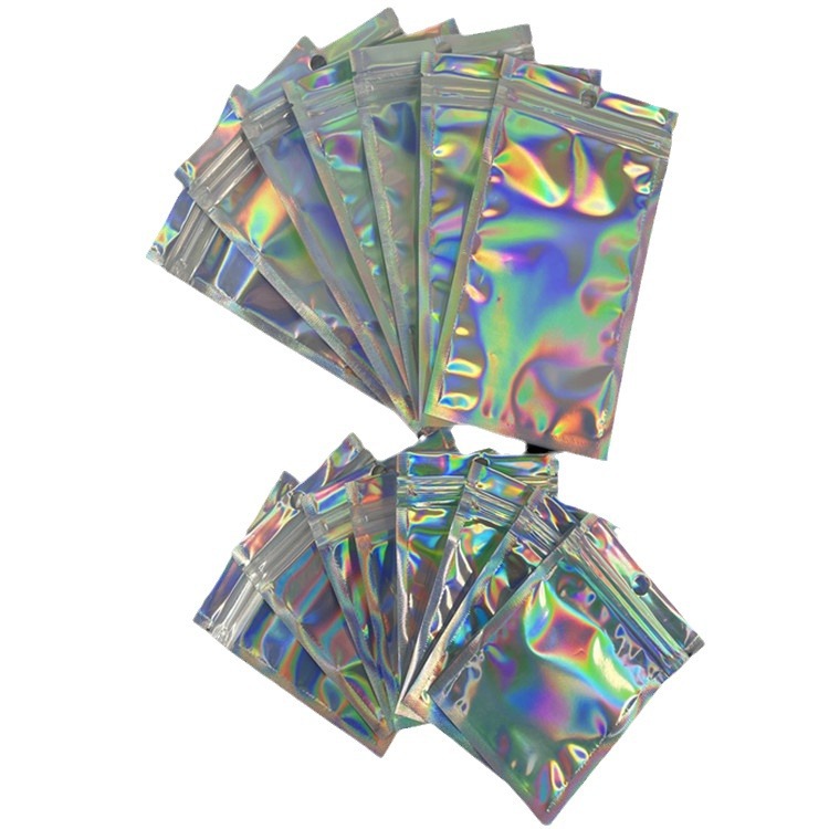 Joyería bolsa ziplock láser yin y yang bolsa de hueso tarjeta flash bolsa de embalaje de la cáscara del teléfono móvil bolsa de artes de pesca bolsa universal