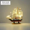 Black and red edge 20cm sailing ship+light line+box