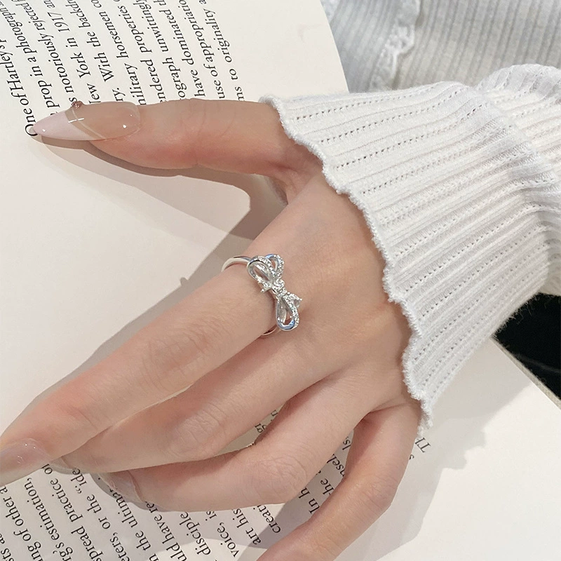 Fashionable sophisticated ring with bow, silver 925 sample, light luxury style, high-quality style, on index finger