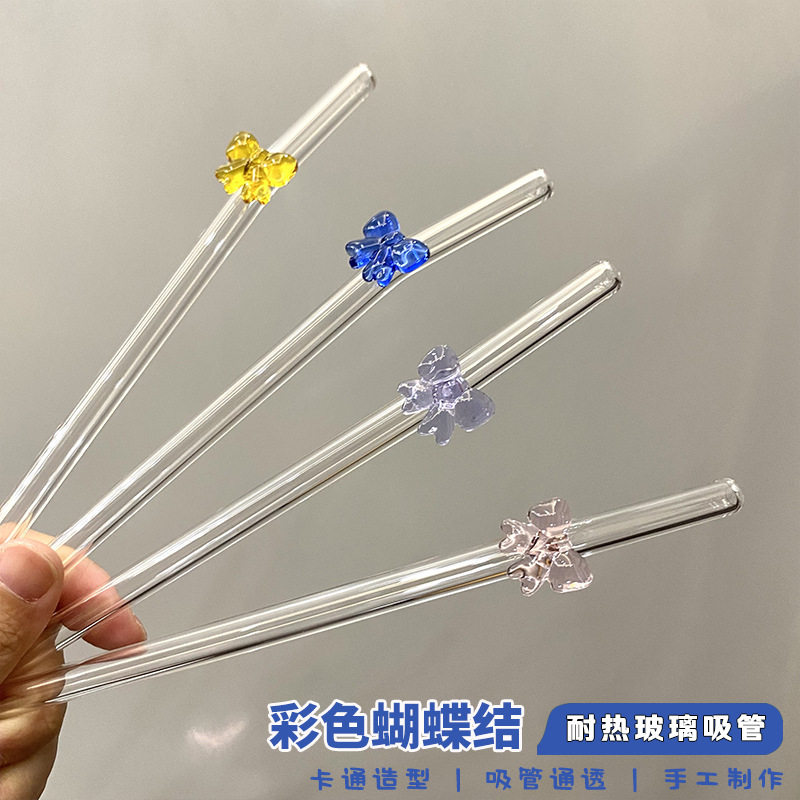 Transparent glass straw with bow