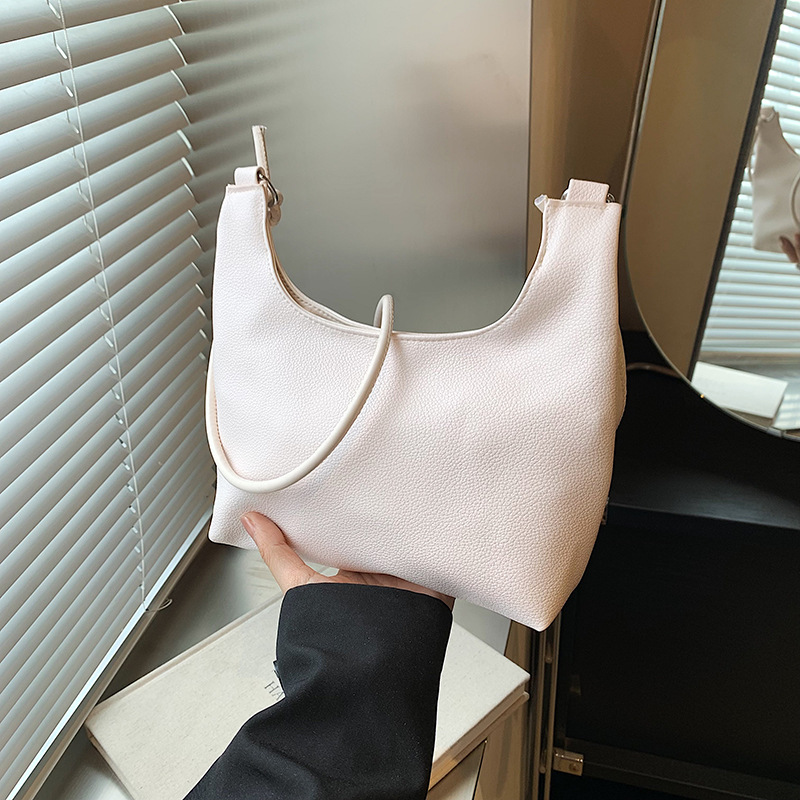 Bolso de diseño de nicho para mujeres este año, sensación de alto nivel de super caliente, bolso de hombro de moda, textura de bolso de cubo