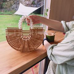 夏の売れ筋織バッグ 2025 フォレストスタイルレディースファッション中空大容量パールウッドビーズハンドバッグ