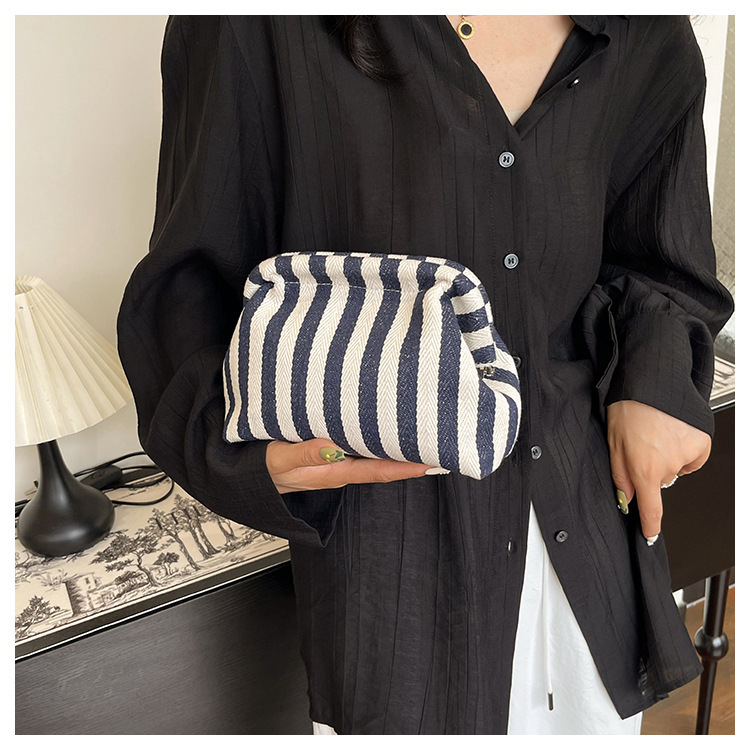 New cross-border fashion color-blocking striped cosmetic bag, women's loose change mobile phone storage bag, trendy and niche cloud clutch undefined