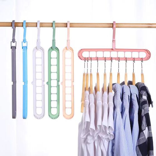 The nine-hole clothes hanger is the same multi-functional clothes hanger that can be used in both directions and storage. The rotating clothes drying rack is a magic tool for organization