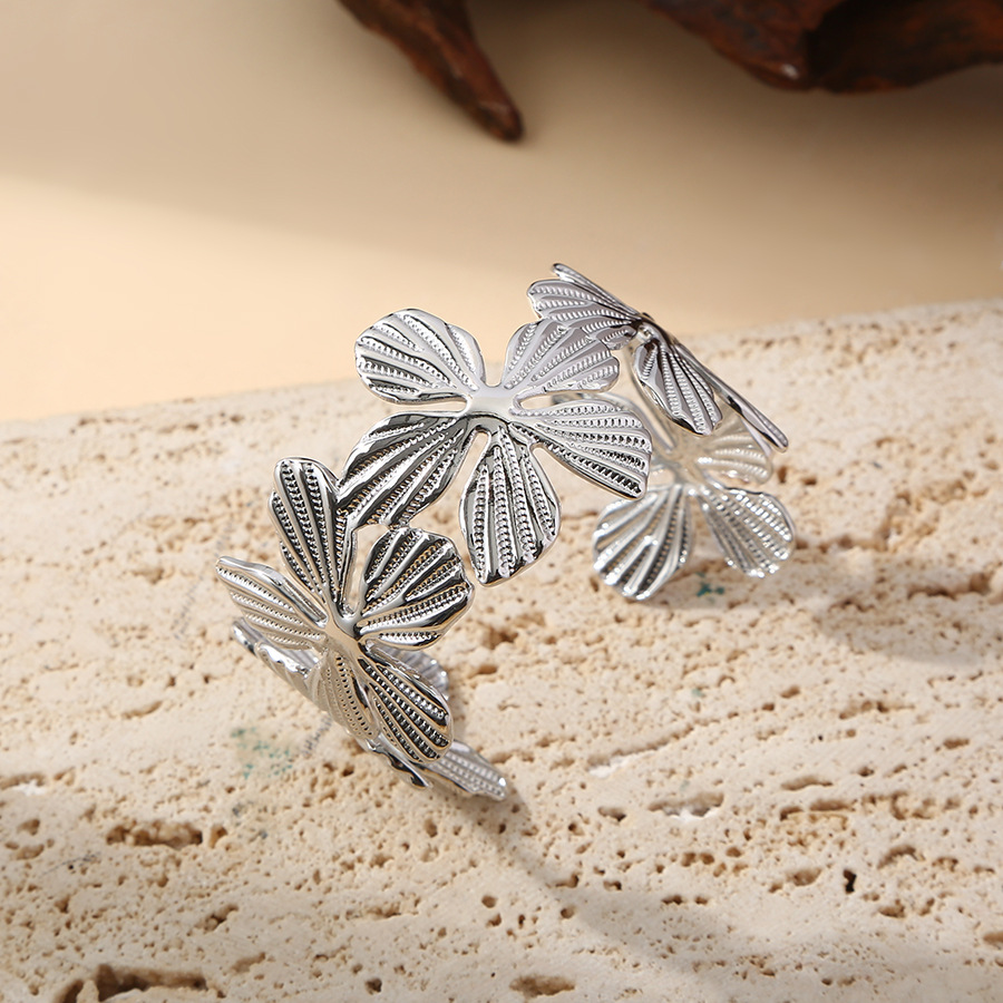 Europa y los Estados Unidos explotaron pulseras de flores de moda personalidad femenina de apertura retro empalme diseño ancho nicho de diseño de joyas