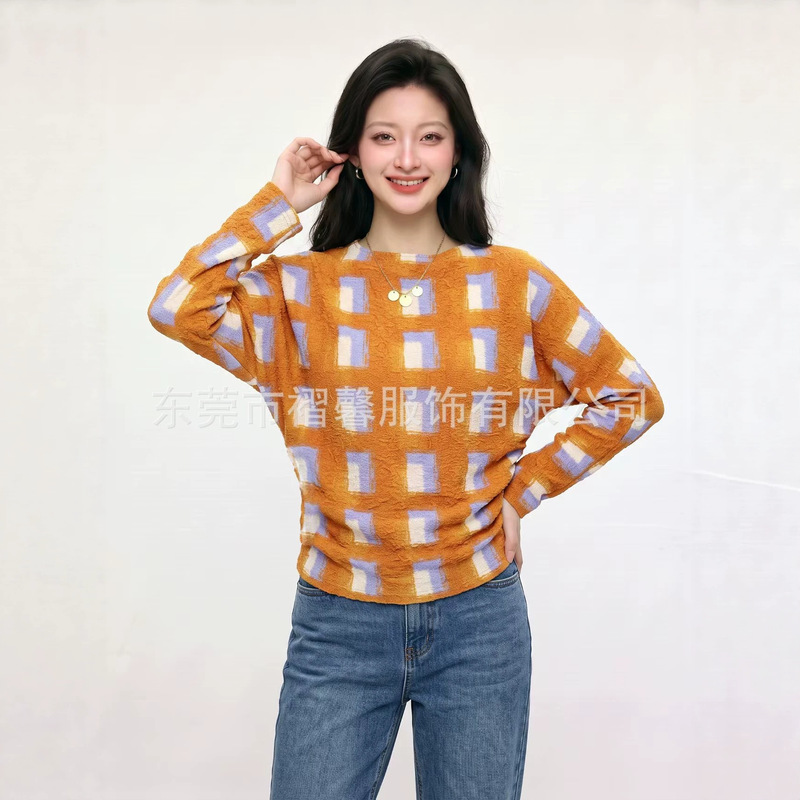 Miyaki long-sleeve top for women with contrasting color block print, round neck, loose fit, bat sleeves, and pleated design Miyaki long-sleeve top for women with contrasting color block print, round neck, loose fit, bat sleeves, and pleated design
