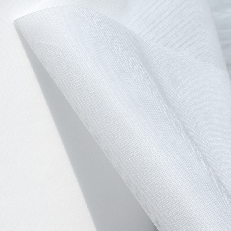 Blanco no tejido bolsa de mano rollo PP tela acrílico no tejido materia prima bobina espinada no tejida regenerada