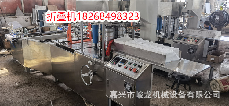 压缩毛巾浴巾折叠机一次性毛巾浴巾折叠机 厂里现机出毛巾机