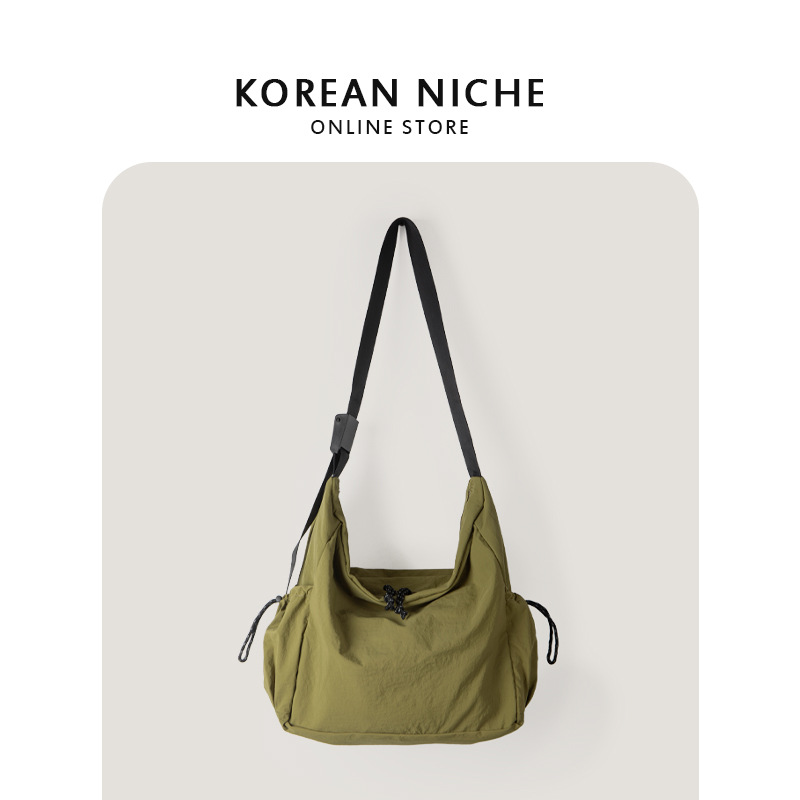 Nuevo estilo coreano versátil casual bolsa de asas de nylon para estudiantes mujeres nicho diseño ligero de gran capacidad hombro mensajero bolsa
