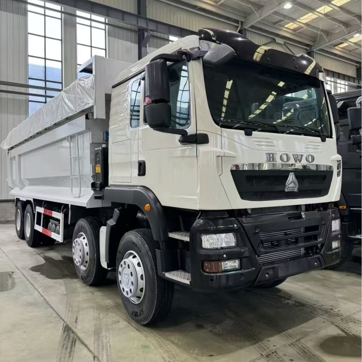 Cross-border Sinotruk HOWO TX Dump Truck, High Horsepower, Left and Right Steering Options, Mining Sand and Gravel Transport Tipper Truck