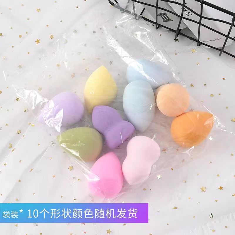 Una bolsa grande de múltiples no comer polvo belleza huevo maquillaje soplo esponja huevo no comer polvo herramientas de maquillaje gota de agua oblicua