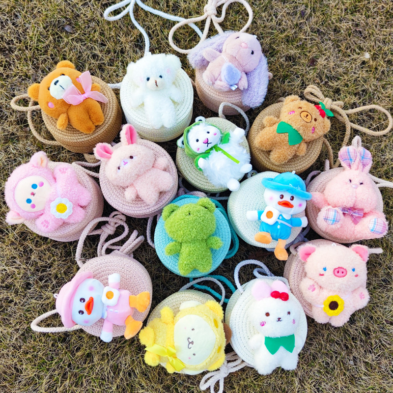 Bolsa de paja de verano 2023 nueva moda para niños bolso femenino lindo crossbody tejido pequeño bolso redondo niños y niñas al por mayor