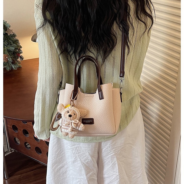Bolso de cubo popular coreano para mujeres 2026 primavera nuevo nicho Zhong tote bag de alta calidad mochila de viaje