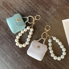 Factory direct sales pearl bag pendant car keychain handmade mini bag accessories jewelry pu leather d buckle wholesale