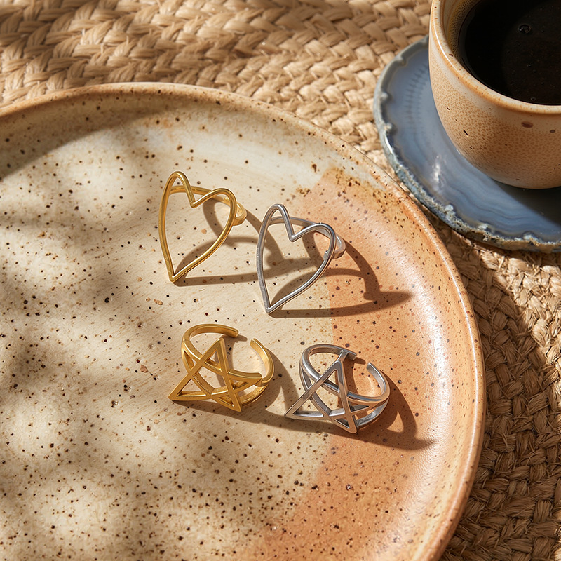 Tiana Europa y América transfronterizos ins aire frío acero inoxidable oro estrellas amor abierto anillo nicho de alta calidad mujer