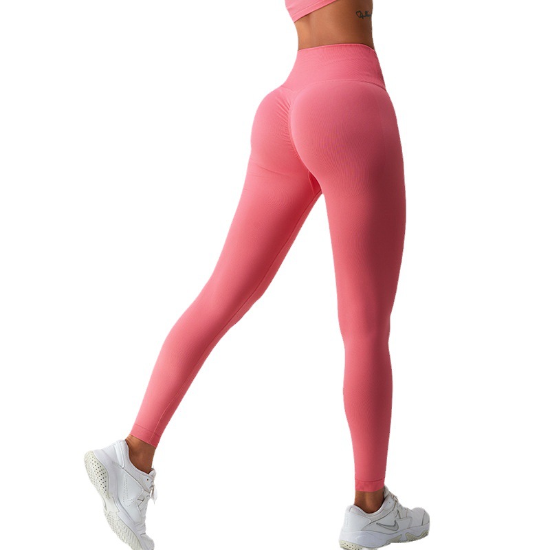 Pantalones de yoga sin costuras de Europa y América de cintura alta Peach Hip lifting pantalones de fitness correr medias deportivas ropa de Yoga de secado rápido