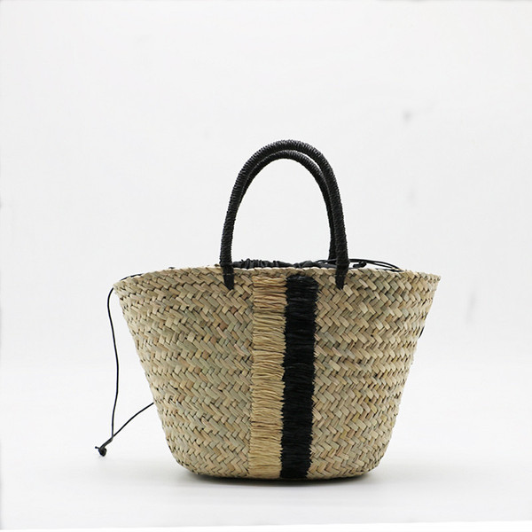 handheld straw blue black woven aquatic plants