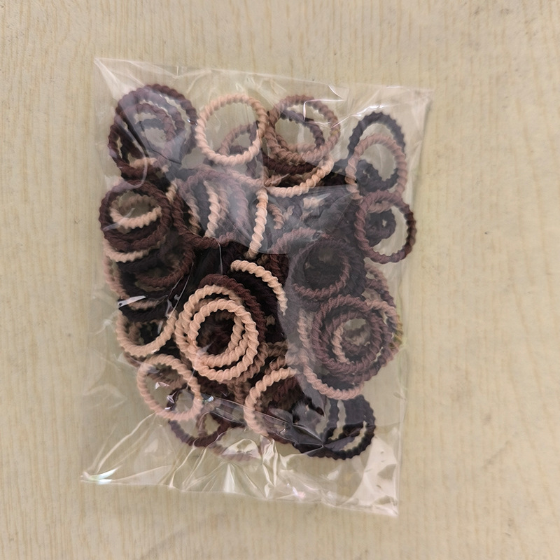 Solo al por mayor cuerda de pelo negro banda de pelo femenino estilo coreano alta elasticidad no duele el pelo banda de goma corbata alta Cola de Caballo accesorios para el cabello del bebé