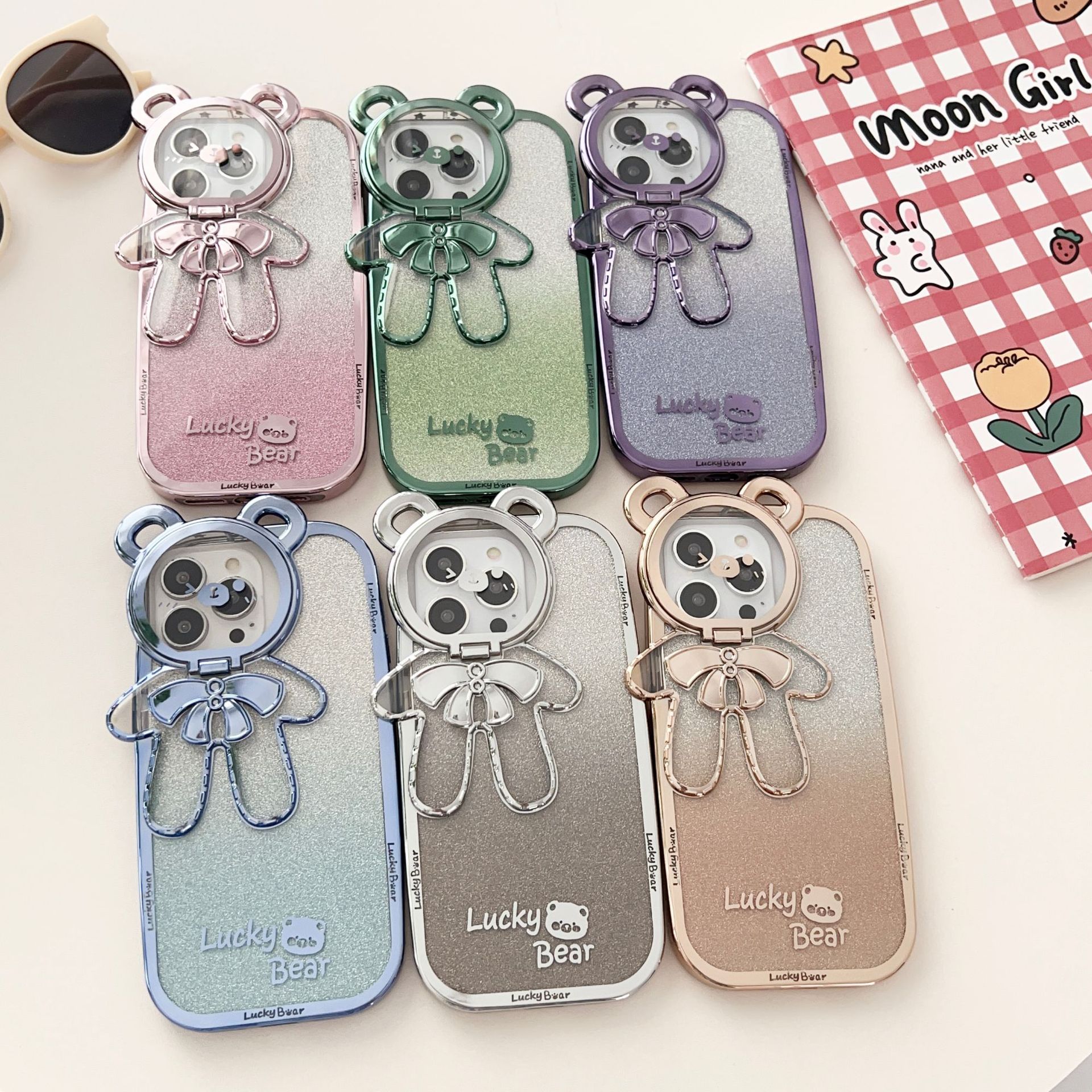 Suitable for iPhone 15 Electroplated Gradient Flash Pink Lucky Bear Apple 14 Lens Protection Stand Phone Case_voghion.com