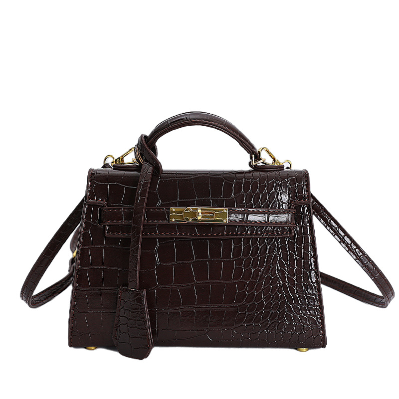 Bolso de mano caliente para mujeres 2025 nuevo estilo transfronterizo de alto nivel con patrón de cocodrilo lujoso y versátil bolso de hombro