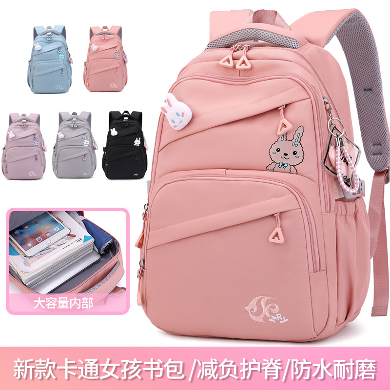 Peces naturales transfronteriza nueva mochila de estudiante de escuela primaria Reducción de carga de gran capacidad para niñas Entrega de mochila simple de color sólido ligero