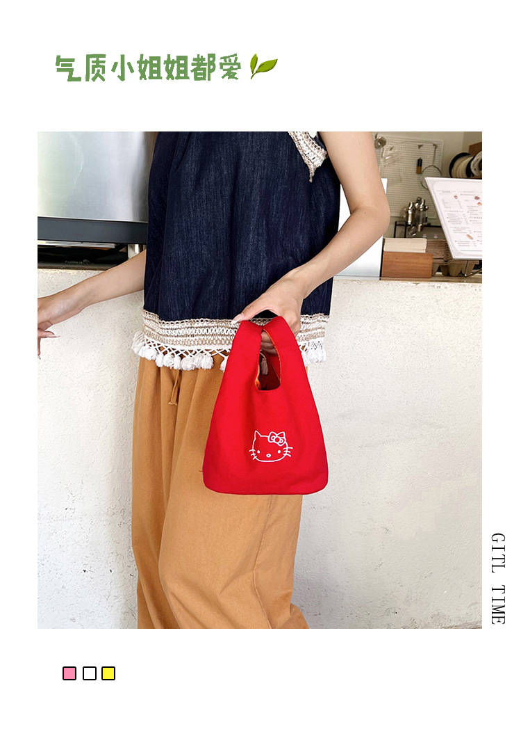 2025 New canvas handbag, a popular female cartoon bucket bag, versatile for Japan and South Korea, and an ins hand-held tote lunch box bag full figure