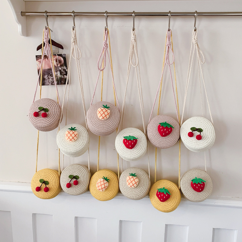 Nuevo bolso para niños lindo bebé bolso de cinturón pequeño bolso redondo de gancho costera bolsa de tejido de paja frutas fresas mini bolso de cambio