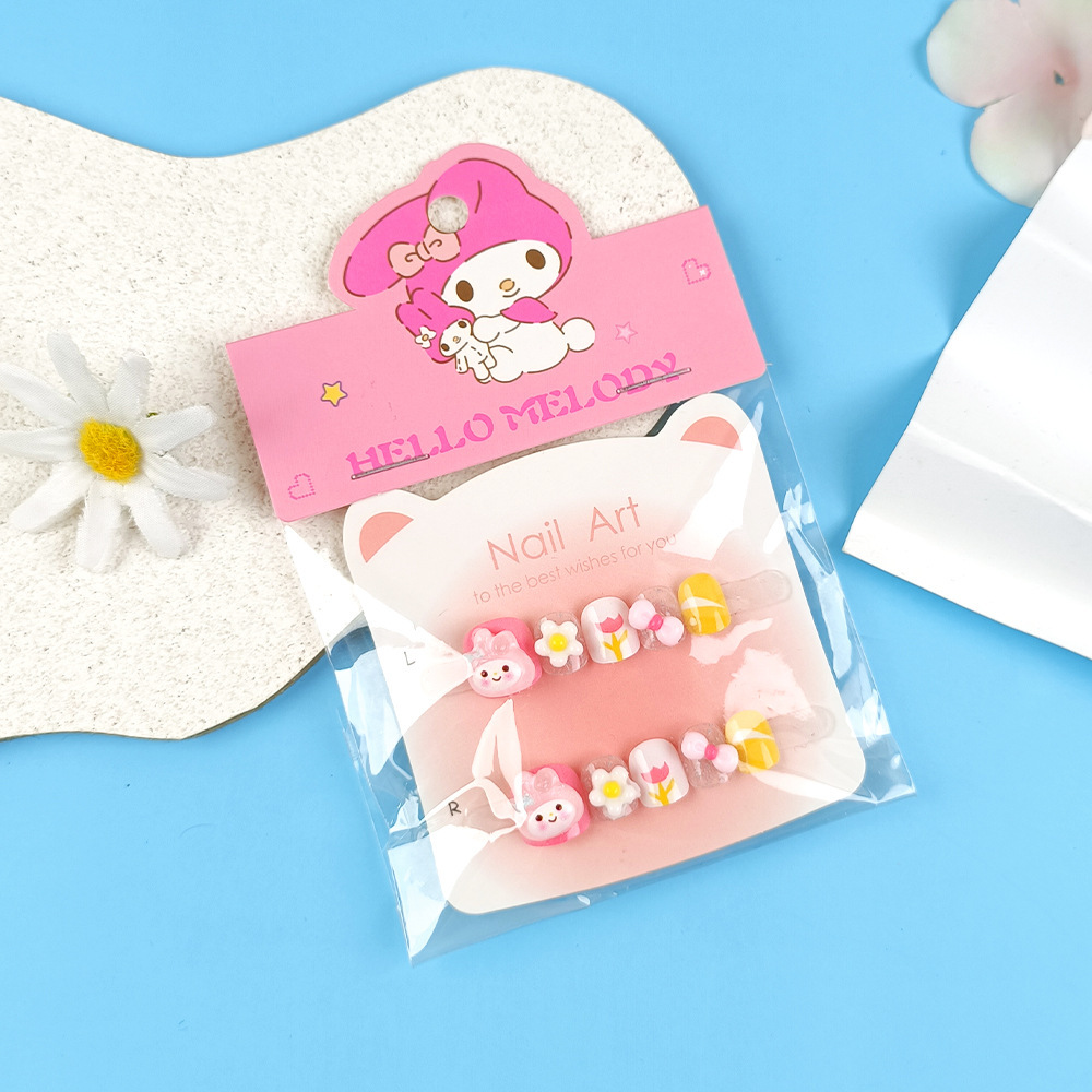 Punto de perforación diez piezas de papel de cartón de manicura gato arco de mariposa niños que usan uñas dibujos animados adorables parches de uñas para niños