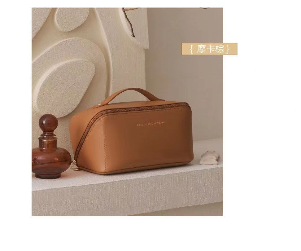 2023 Nueva celebridad de Internet PU bolsa de cosméticos de doble cremallera bolsa de lavado Portátil Bolsa de almacenamiento de cosméticos de viaje textura